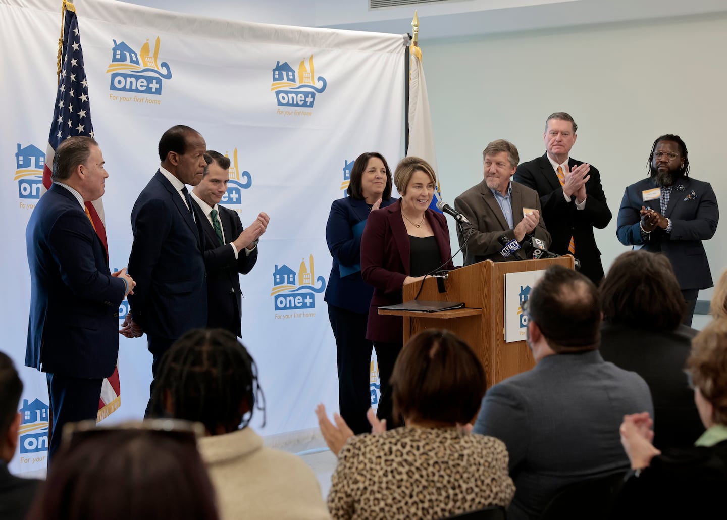 Governor Maura Healey, seen here with Eastern Bank CEO Bob Rivers and other community and business leaders, has courted the business community throughout her first term.
