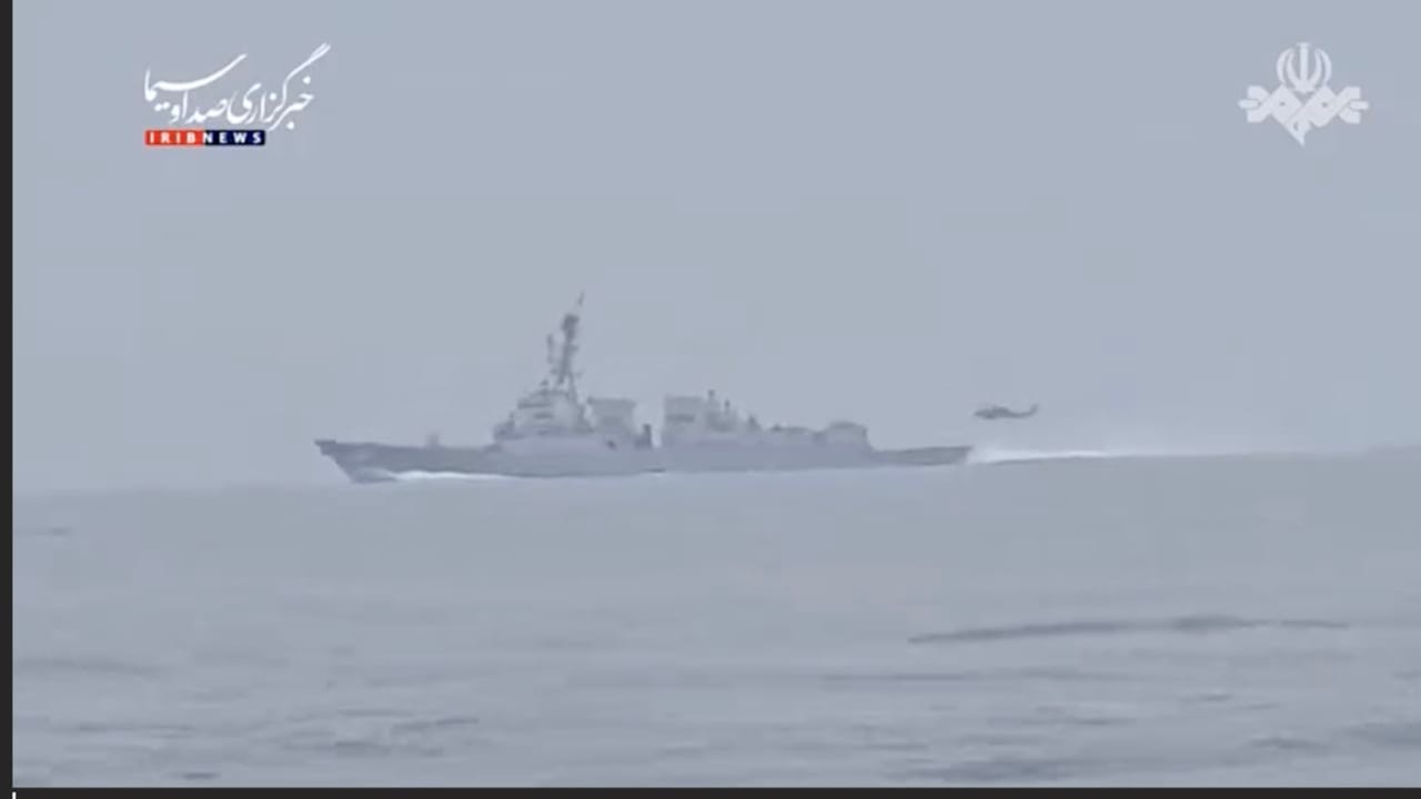 SCREENSHOT FROM a video released by Iranian media showing an encounter between the IRGC Navy and a US warship in the Strait of Hormuz, which they claim withdrew from the area after receiving a warning.