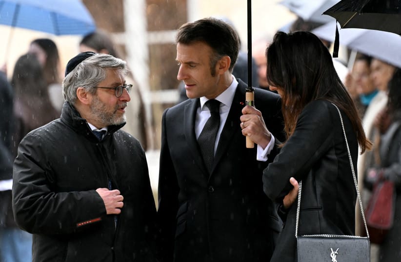 (From L) Chief Rabbi of France Haim Korsia, France's President Emmanuel Macron and Anne-Laure Abitbol, sister of Ilan Halimi, a 23-year-old French Jew who was tortured and murdered in 2006, attend a ceremony commemorating the 20th anniversary of his murder at The Elysee Presidential Palace in Paris.